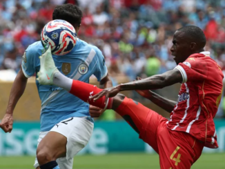 Manchester City’s Vitor Reis tries to get the ball off Wydad Casablanca’s Thembinkosi Lorch (right). Photo: AFP Image: AFP